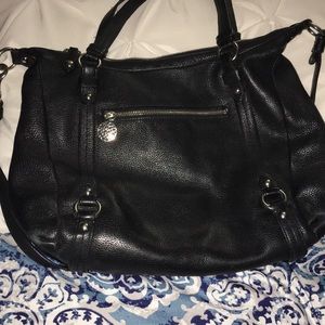 Black coach bag with purple lining
